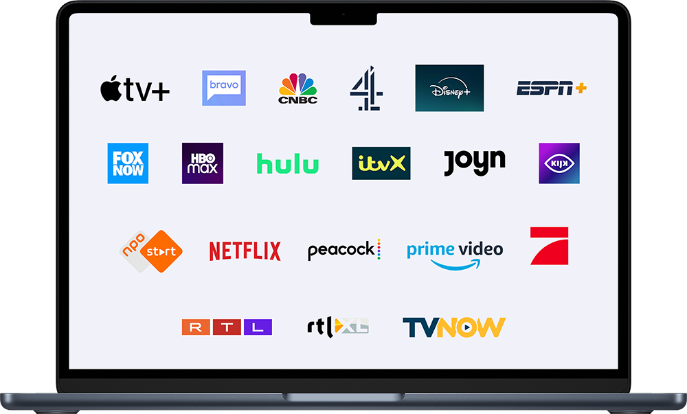 A laptop with a screen showing various Video-on-demand providers from multiple countries, including Apple TV, Bravo, CNBC, Channel 4, Disney Plus and many more