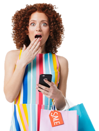 woman with red curly hair and shopping bag